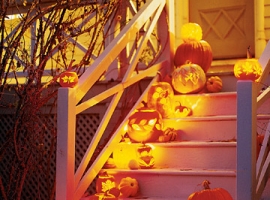 halloween porch decor with carved pumpkins