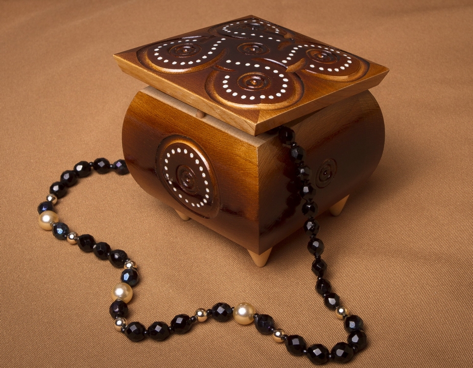 Varnished carved jewelry box inlaid by beads by Perfect Boxes