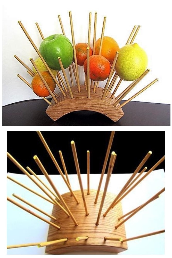 Unique wooden fruit holder where each fruit hangs in the air