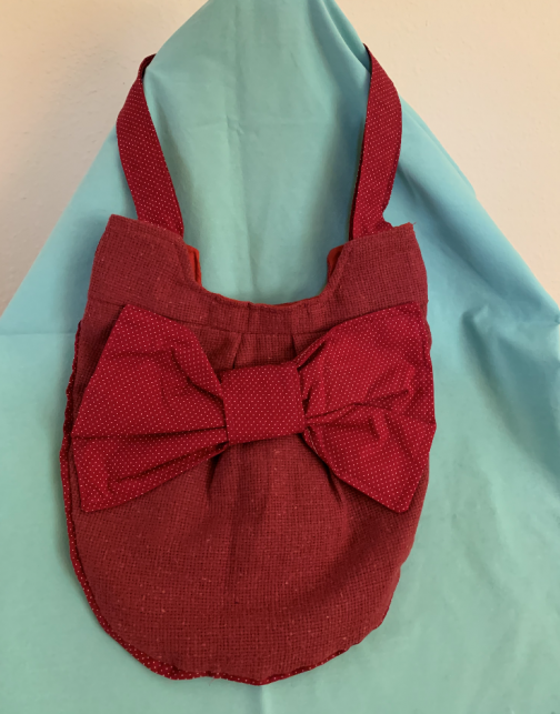 red purse with bow