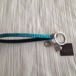 turquoise wristlet keychain with braille