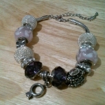  beautiful purple an white bracelet great for any women