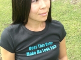 DOES THIS BABY MAKE ME LOOK FAT-maternity tee-black with teal print