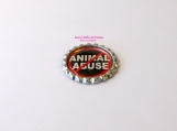 Stop Animal Cruelty Flattened Bottle Cap Magnets