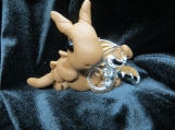 Brown polymer clay dragon with silver dragon charm