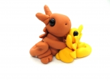 Mommy and baby dragon figurine
