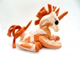 Orange and white polymer clay unicorn