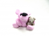 Pink polymer clay bear with a puppy
