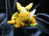 Polymer clay orange & green swirl dragon sculpture
