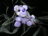 Polymer clay purple bear car charm with a dragonfly