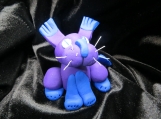 Purple silly cat sculpture