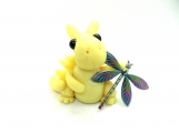 Yellow clay dragon with a dragonfly