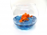 Round goldfish bowl with a goldfish