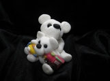 White clay mommy bear & baby with a train & plane