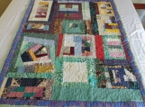 Just a little crazy, crazy scrap quilt; machine pieced and quilted 100% cotton.