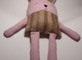 Maude, a fluffy pink fabric bunny,