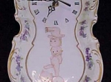 Hand Painted Porcelain Wall clock with Kewpie and Violets Decor