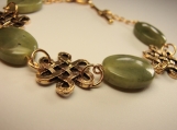 Olive jade with celtick conectors gold plated bracelet