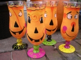 Hand painted pumpkin halloween hurricane/daquiri glasses. set/4