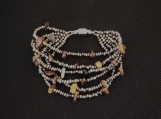 Unusual Six Strand Tiger Eye stone and metal bead bracelet
