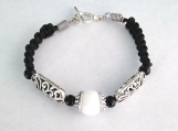 Ceramic Pearl and Filigree Accents with Macrame Band 