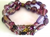 Striking Flower and Purple Crystal Center stretch bracelet