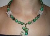 Fashionable crysoprase gemstone necklace with leather components