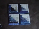 Quilted blue Log Cabin Coasters