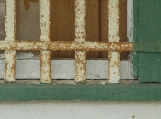 Color Photo, Window of Old Abandoned Store