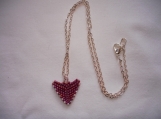 A single heart beaded necklace