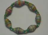 Multil colored paper beads coated with satin varnish.