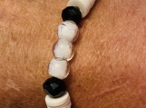 White and black Heishi beads