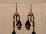Black leaves and copper flowers