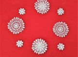 Set of 8 knitted snowflakes for the Christmas tree or as a decor