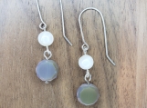 Iridescent gray glass with white shell beads