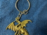 Brass tone dragon keychain