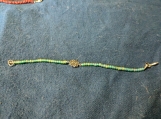 Flower bracelet with sea green beads