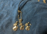 Siamese cats pendant set on waxed rope