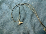 Whale's Tail Pendant on rope necklace