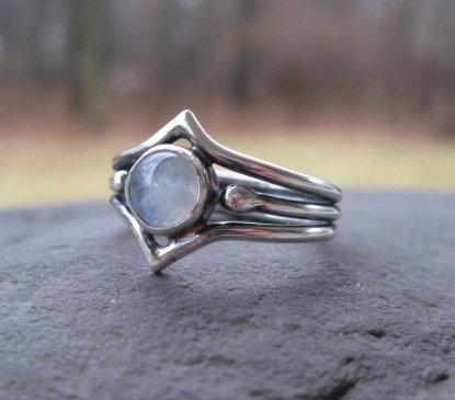 Silve ring sculpted in sterling silver with rainbow moonstone by Christen Largent 