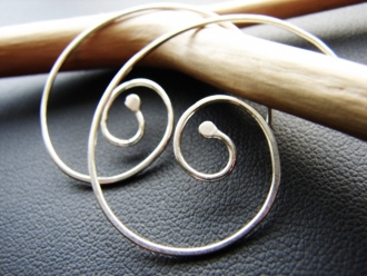 Nautilus hammered sterling silver earrings. 