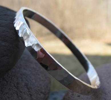 Disco Ball Bangle . sterling silver . hammered to a mirror shine 