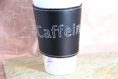 Eco-friendly embroidered coffee sleeve