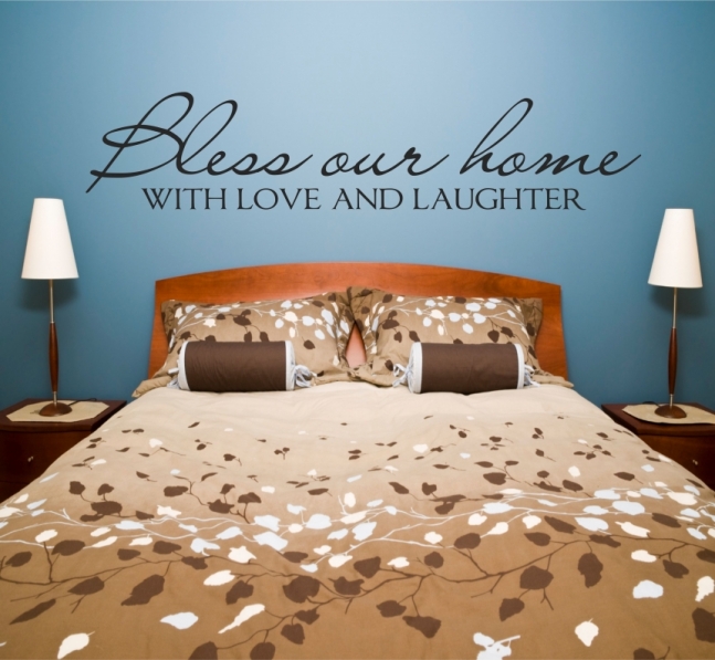 wall decal reading "bless our home with love & laughter"