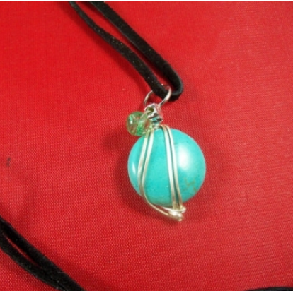 wire wrapped turquoise stone pendant on black string- necklace