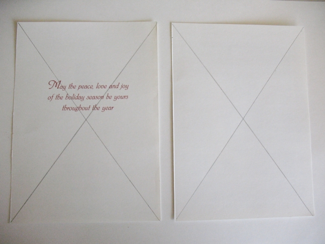 Cut card in two and draw an"X" from corner to corner