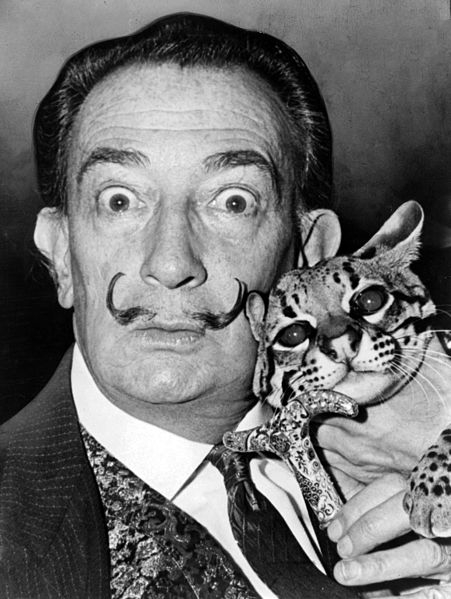 Salvador Dali with his wild cat, ocelot.