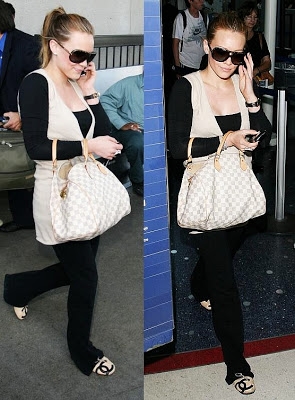 Hillary Duff in designer stuff at the airport.