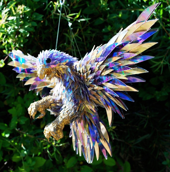 Hummingbird made out of shattered CDs.