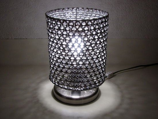 Lamp made of pop-tops of soda cans.